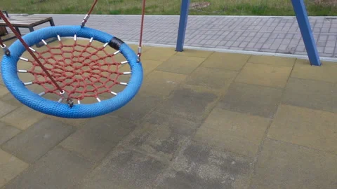 Empty round swing in slow motion Stock Footage 158909809