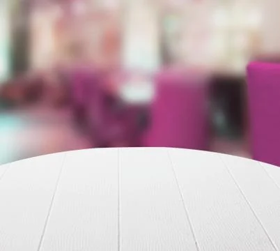 Empty round white table in a restaurant Stock Photos