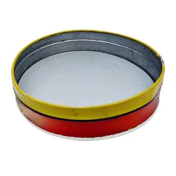 Empty Round Yellow Red Tin 스톡 사진