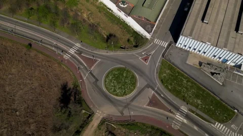 Empty roundabout in an industrial zone in Italy. Infrastructure layout showing Stock Footage 335281216
