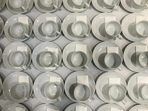 Empty row of coffee cup on the table Stock Photos