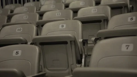 Empty Row Of Numbered Grey Plastic Arena Seating Stock Footage 100649967