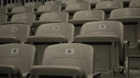 Empty Row Of Numbered Grey Plastic Arena Seating Stock-Footage 100649993