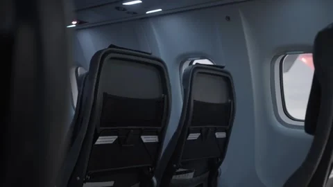 Empty rows of airplane seats during vacant flight at night time Stock Footage 304462845