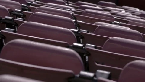 Empty rows of chairs in a high school football stadium Stock-Footage 77082431