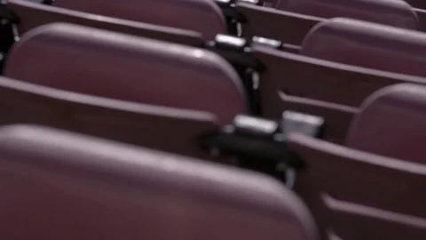 Empty rows of chairs in a high school football stadium 스톡 동영상 77082435