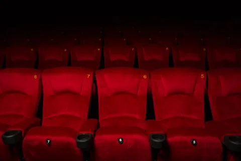 Empty rows of red theater or movie seats Stock Photos