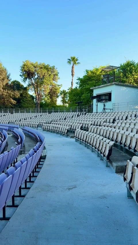 Empty rows of seats in a large outdoor stadium Video stock 331975124