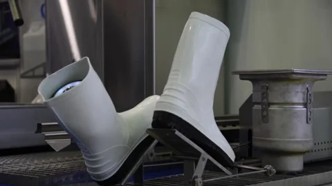 Empty rubber boots stepping on pedals Stock Footage 292673003