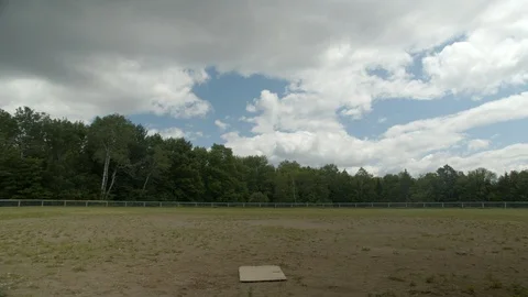 Empty Rural Baseball Field Clouds moving overhead, 4k Video stock 111596287
