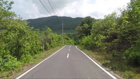 Empty rural road with nature view, Karimunjawa islands, Indonesia Stock Footage 160121928