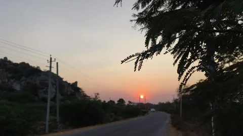 Empty Rural Road at Sunset with Warm Evening Light Stock Footage 327982258