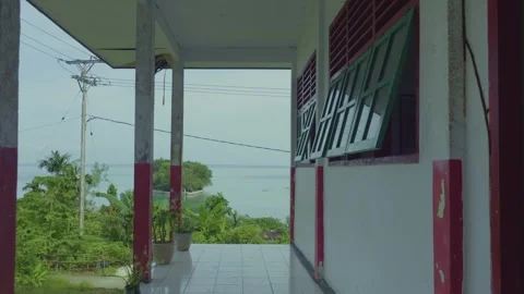 Empty Rural School Corridor with Ocean View in Tropical Village Vídeos de archivo 332421930