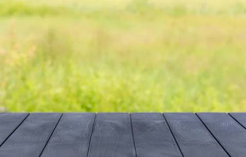Empty rustic texture table top with blur green natural background. Display .. Stock Photos