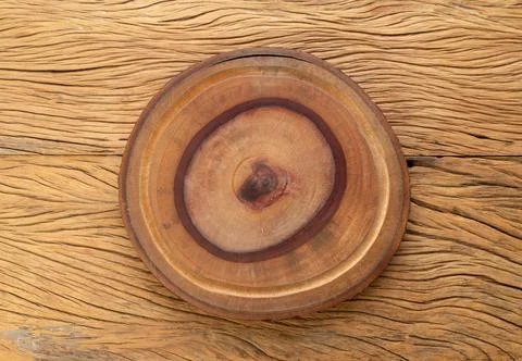 Empty rustic wooden board over wooden table with copy space Stock Photos