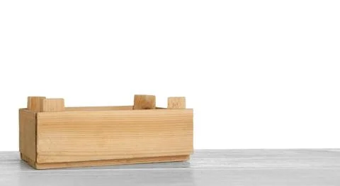 Empty rustic wooden crate on table against white background. Space for text Stock Photos