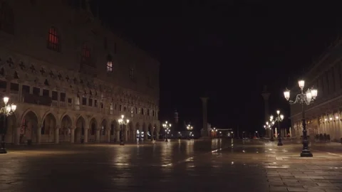 Empty Saint Mark Square with bright lanterns at night Stock Footage 162477927