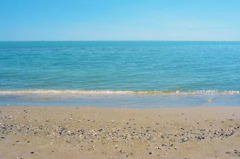Empty sand beach background. Horizon with sky and sea Stock Photos