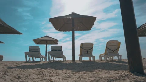 Empty sand beach. Beach with umbrellas and sun beds Stock Footage 161173027
