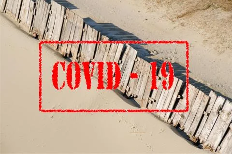 Empty sandy beach closed due coronavirus or covid 19 social distancing lock down Foto stock