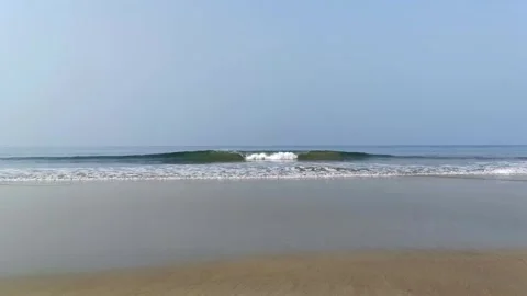 Empty Sandy Beach with Rolling Wave and Calm Horizon in Vengurla, India Stock Footage 314187835