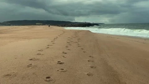 Empty sandy beach stretching along the Atlantic coast 動画素材 345676868