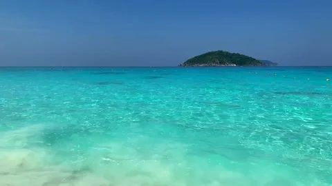 Empty Sandy Beach with White Sand and Amazing Clear Turquoise Sea Stock-Footage 154653039