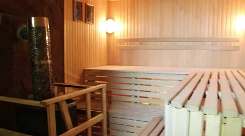 Empty sauna room without people camera moves from the heater to the door 스톡 동영상 47833551