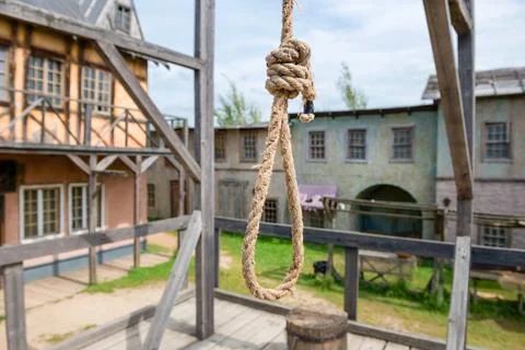 Empty scaffold with a place for execution and wooden gallows Stock Photos