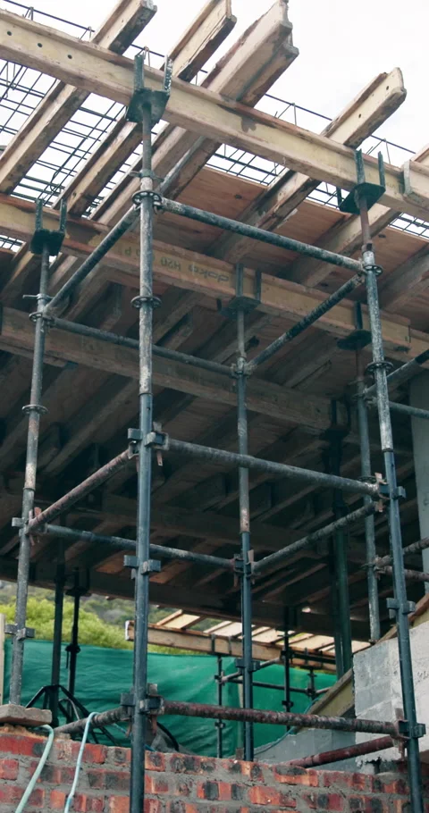 Empty, scaffolding and building outdoor for construction, remodeling and Stock Footage 340903474