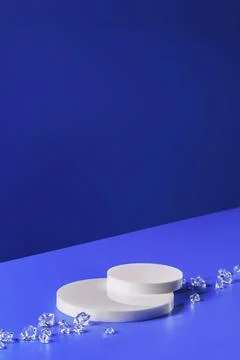 Empty scene with circle podiums on diagonal purple background Stock Photos
