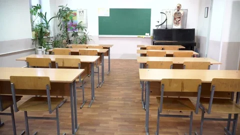 Empty school class with Chairs ,tables and blackboard inside Stock Footage 71984062