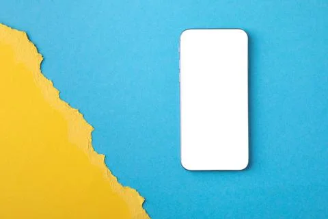 Empty screen mobile phone on the background of the flag of ukraine Stock-Fotos