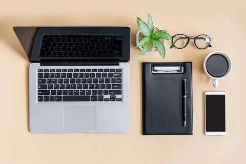 Empty screen Smart phone and file folder on business desk office Fotos Stock