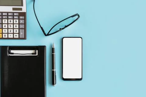 Empty screen Smart phone and file folder on business desk office with copy .. 스톡 사진