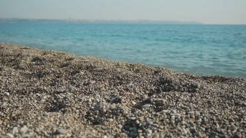 Empty sea small stony beach for the background to a video about a vacation Video stock 225686165