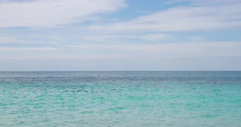 Empty sea wave. Summer sunny day, blue sky, white clouds and water background. Stock Footage 153195206