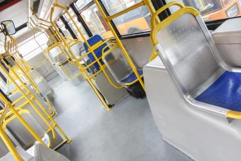 Empty seat inside a city bus Stock Photos
