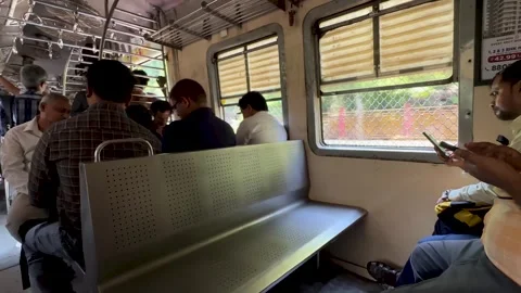 Empty Seating Space in Busy Mumbai Suburban Railway Coach Stock Footage 347024143