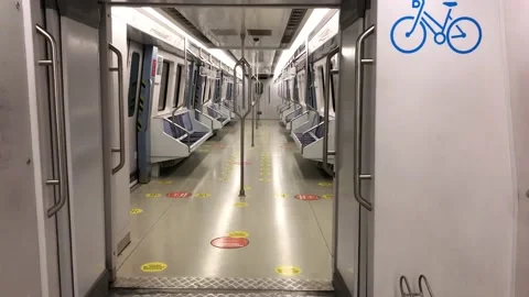Empty seats and corridor of a subway at the station during covid quarantine Stock Footage 145386720