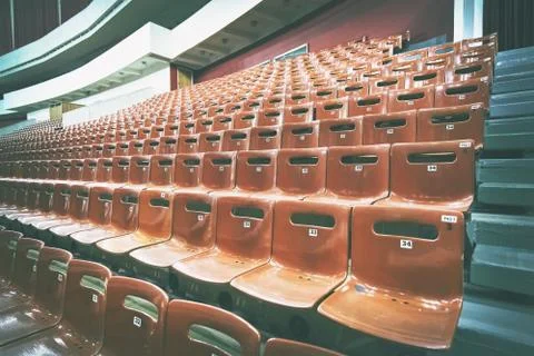 Empty seats in the auditorium. toning.  Concept: lack of interest, failure, b Stock Photos