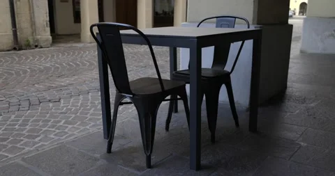 Empty seats of a cafeteria during pandemic covid 19 in an italian city center Stock Footage 150155545