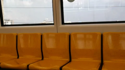 Empty seats in the city train Stock Footage 256291178