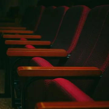 Empty seats in a dark auditorium Foto stock