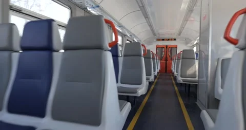 Empty seats in the interior of a passenger train. Inside an empty carriage Stock Footage 222959387