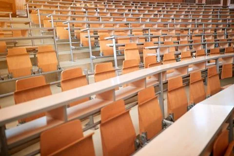 Empty seats in new modern lecture hall or classroom. Stock Photos
