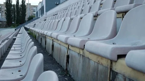 Empty seats in the old stadium in autumn Stock Footage 163915581