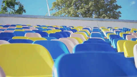 Empty seats in the stadium, closeup. Canceled match, game. Stadium without fans. Stock Footage 121041854