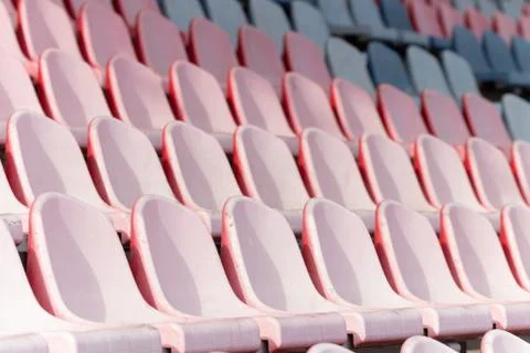 Empty seats in the stands at the stadium due to coronavirus isolation. Stock Photos