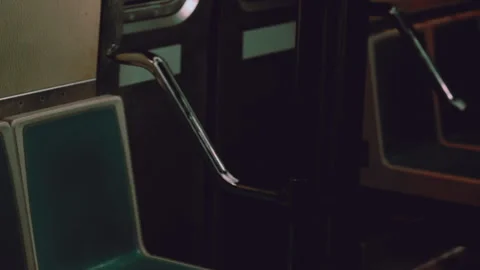 Empty seats on a subway train during late hours in the city Stock Footage 345054319
